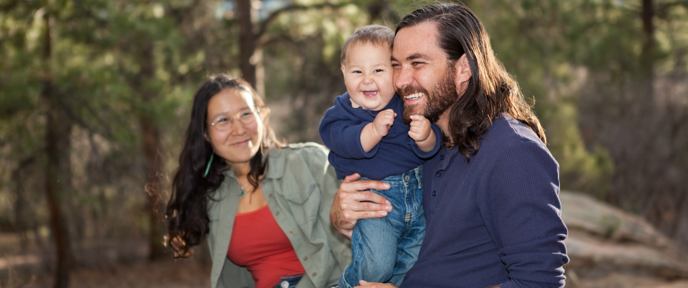 Parents and toddler enjoying a day in nature.