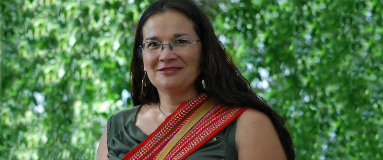 Smiling Métis woman.