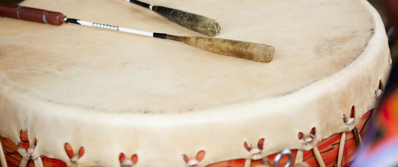 an image of a pow wow drum and sticks